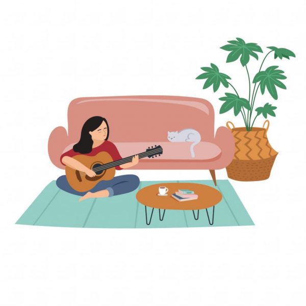 tjej_musik Tjej som spelar musik för sin katt